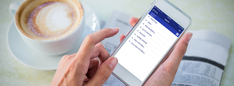 Someone placing a sports bet on the Circa Sports app